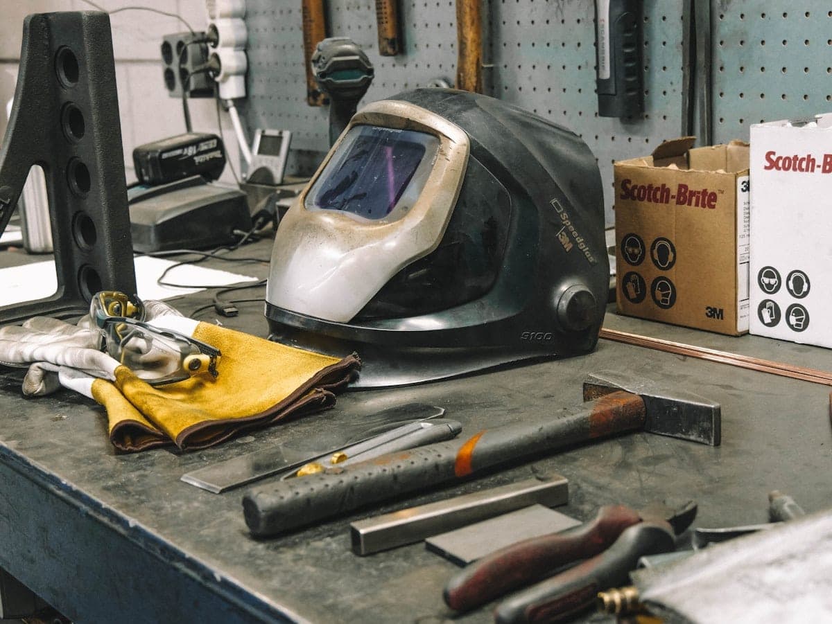 Apprentices at the welding bench in the Trust's training workshop